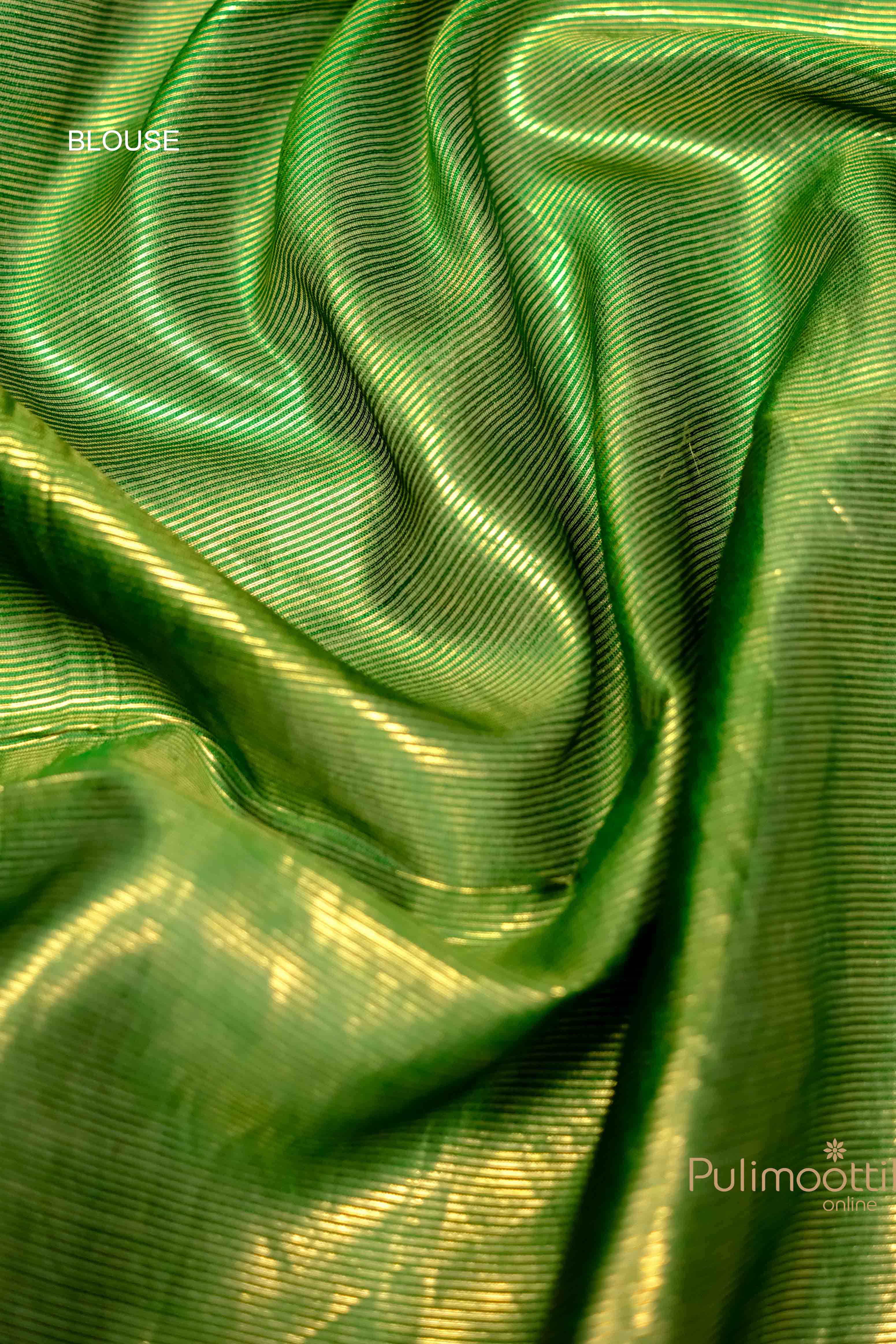 Green blouse fabric with striped pattern, complementing the blue Chiniya Silk Saree.