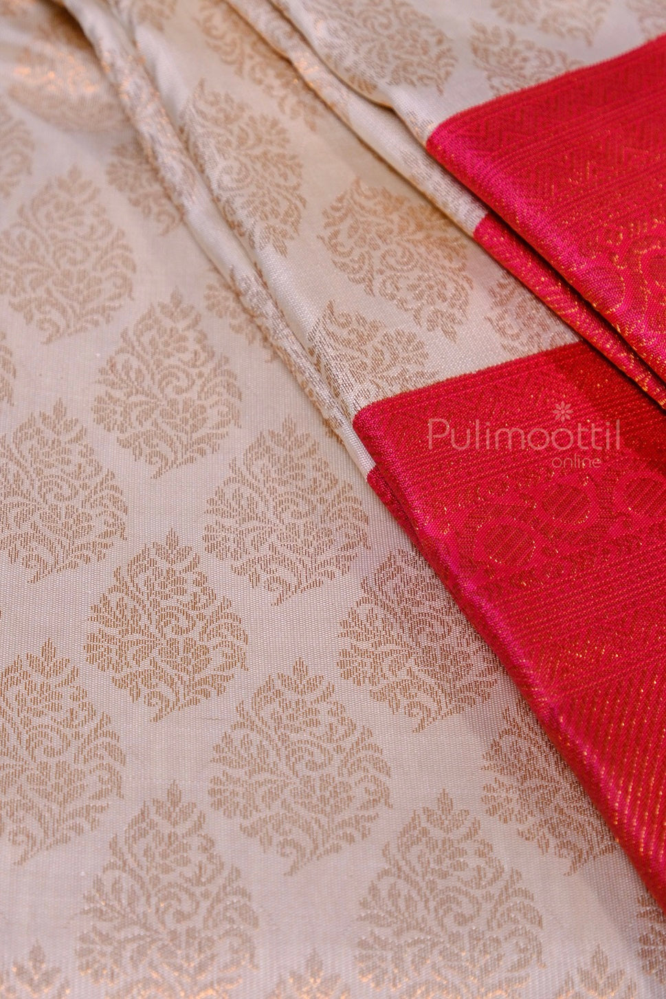 Close-up of ripe plum bridal Kanchipuram saree body with gold zari diamond and square patterns on soft silk