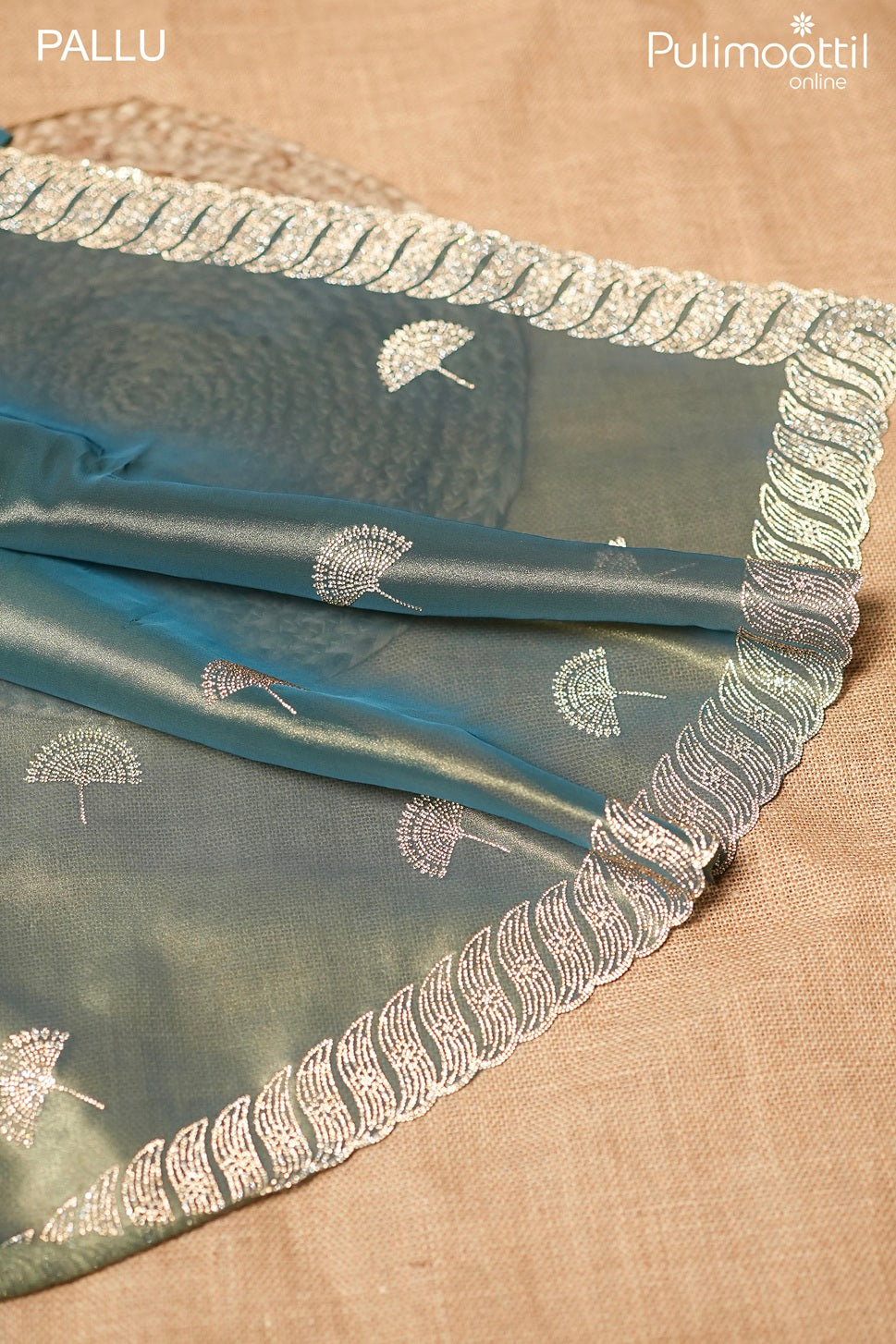 Teal blue color tissue organza fancy saree