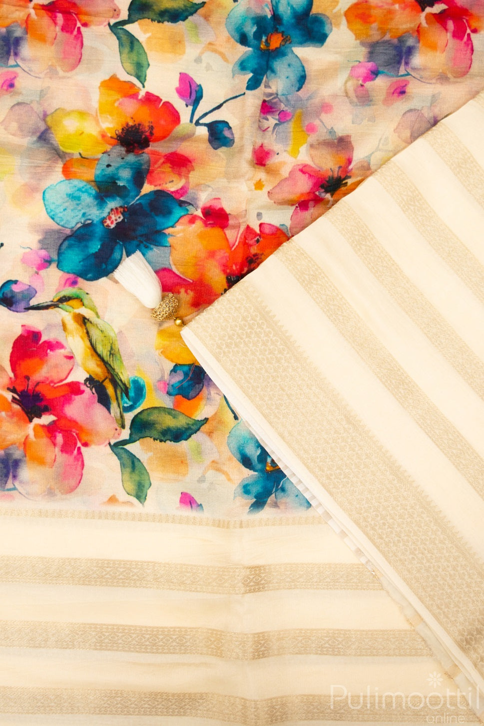 Close-up View of Cream Kerala Saree with Multicolor Floral Digital Print and Gold Zari Striped Border