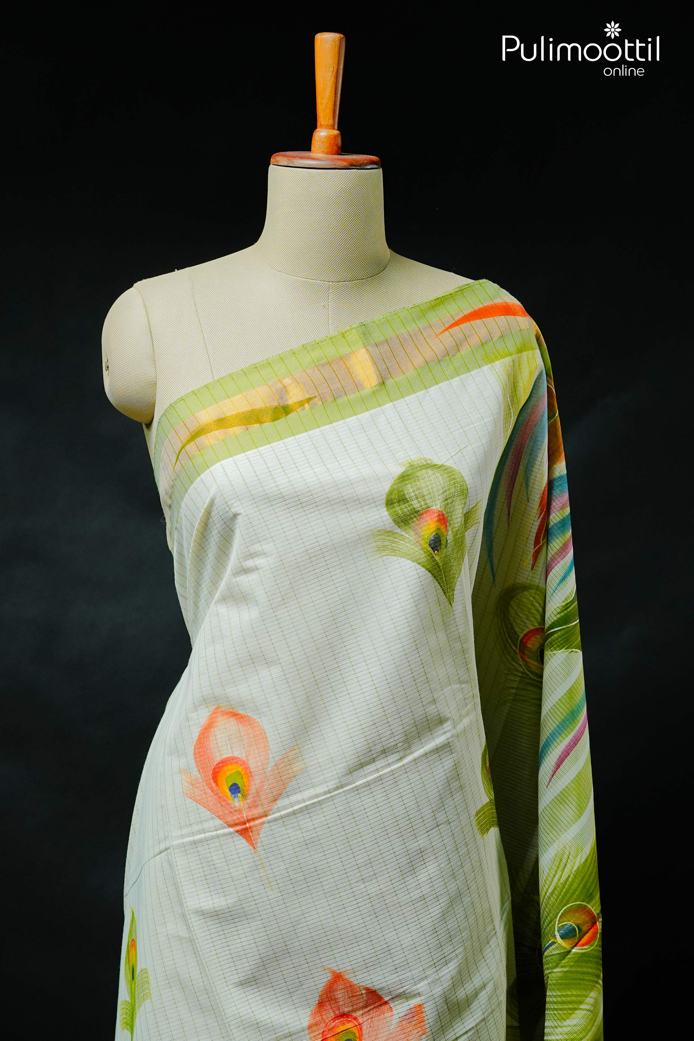 Cream colour Kerala traditional set saree with golden tissue border, subtle stripes, and hand-painted peacock feather motifs — displayed on mannequin.
