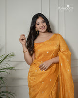 Yellow color crushed Organza saree.