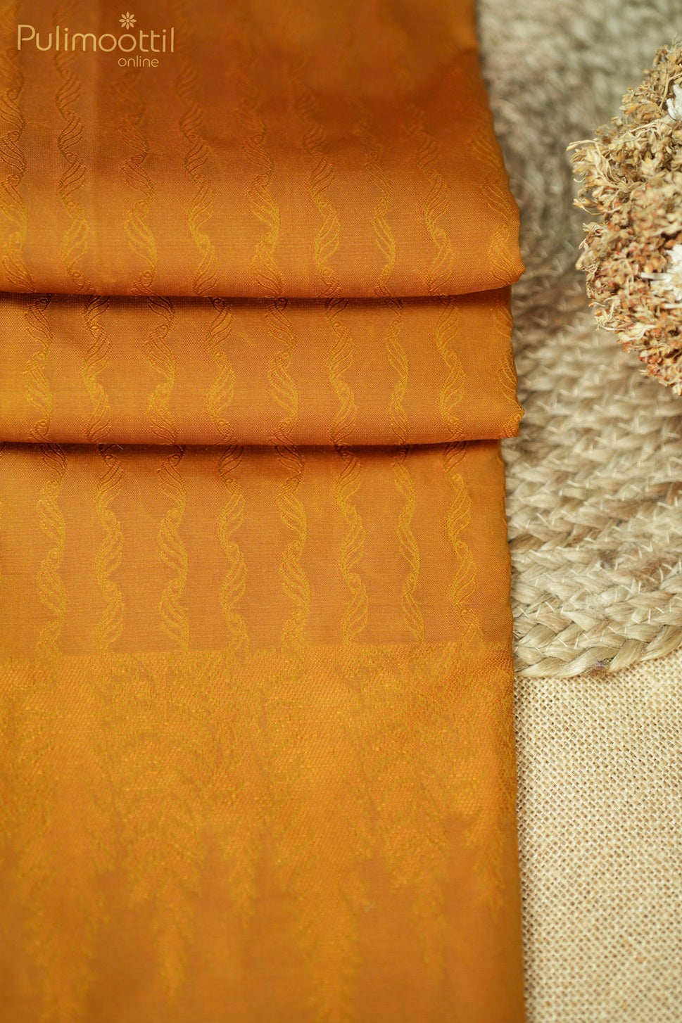 Ochre Colour Self Print Semi Silk Saree.