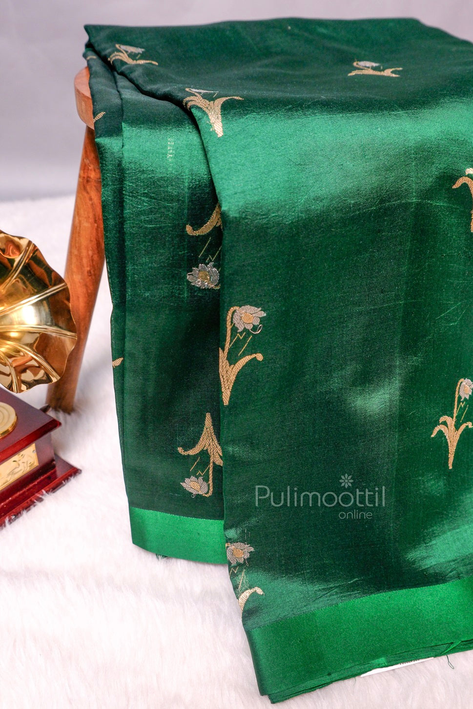Elegant green Kerala silk saree with floral golden zari embroidery – traditional festive wear from Pulimoottil Online