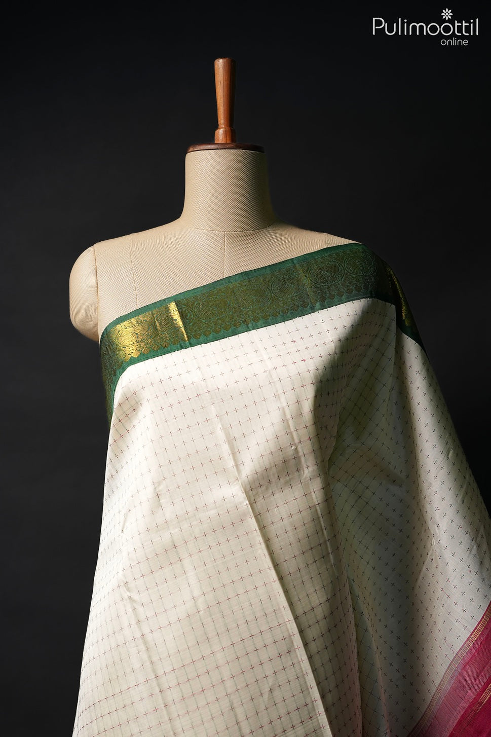 Off white color Kanchipuram traditional saree