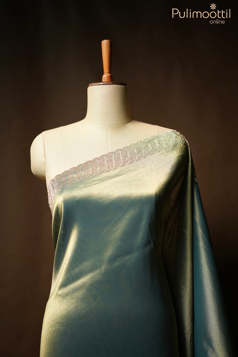 Teal blue color tissue organza fancy saree