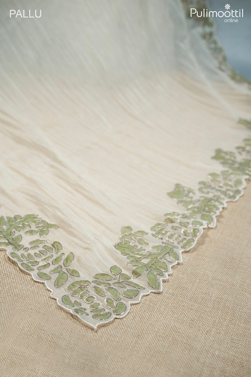 Ivory color crushed organza fancy saree