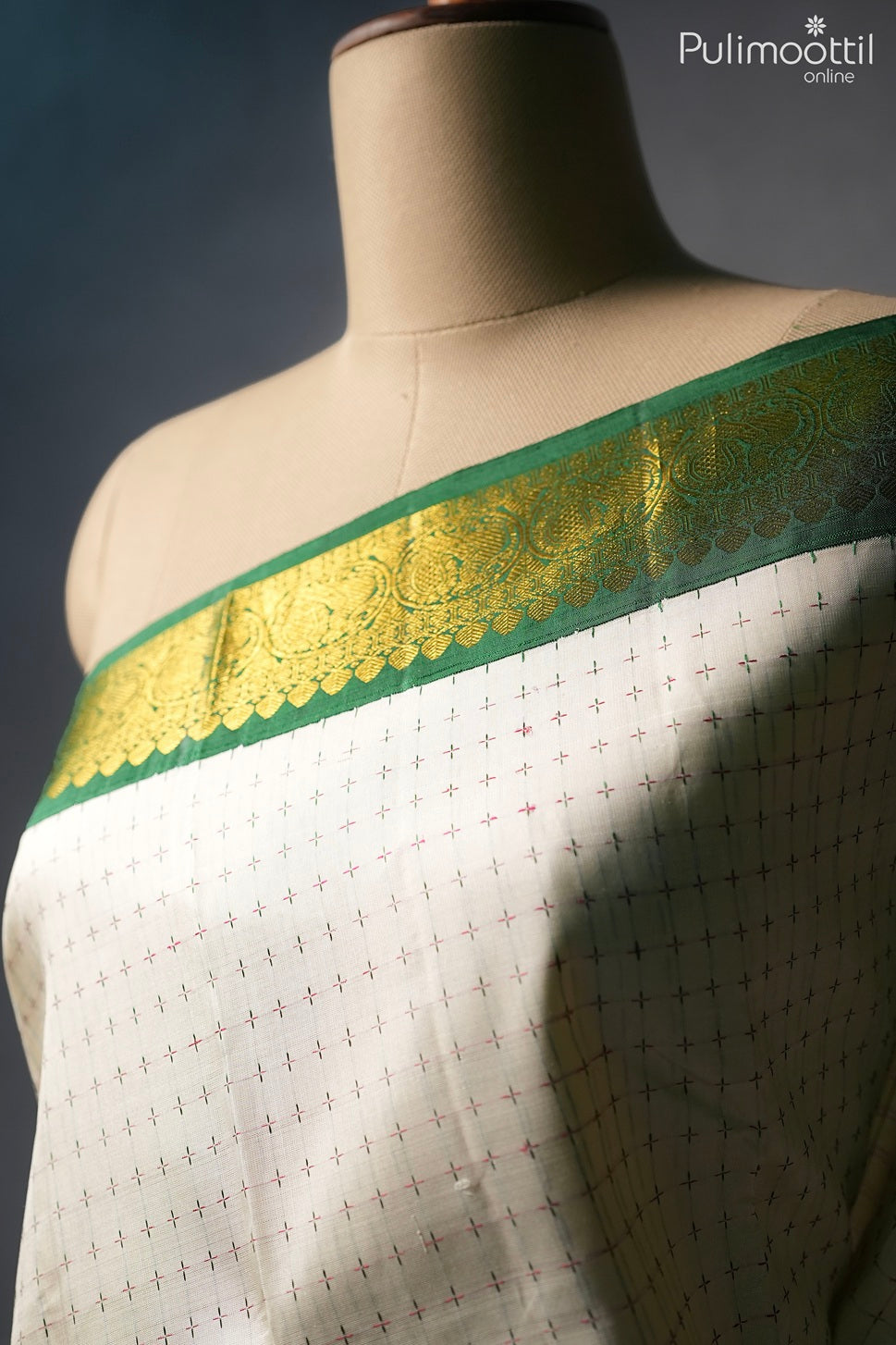 Off white color Kanchipuram traditional saree