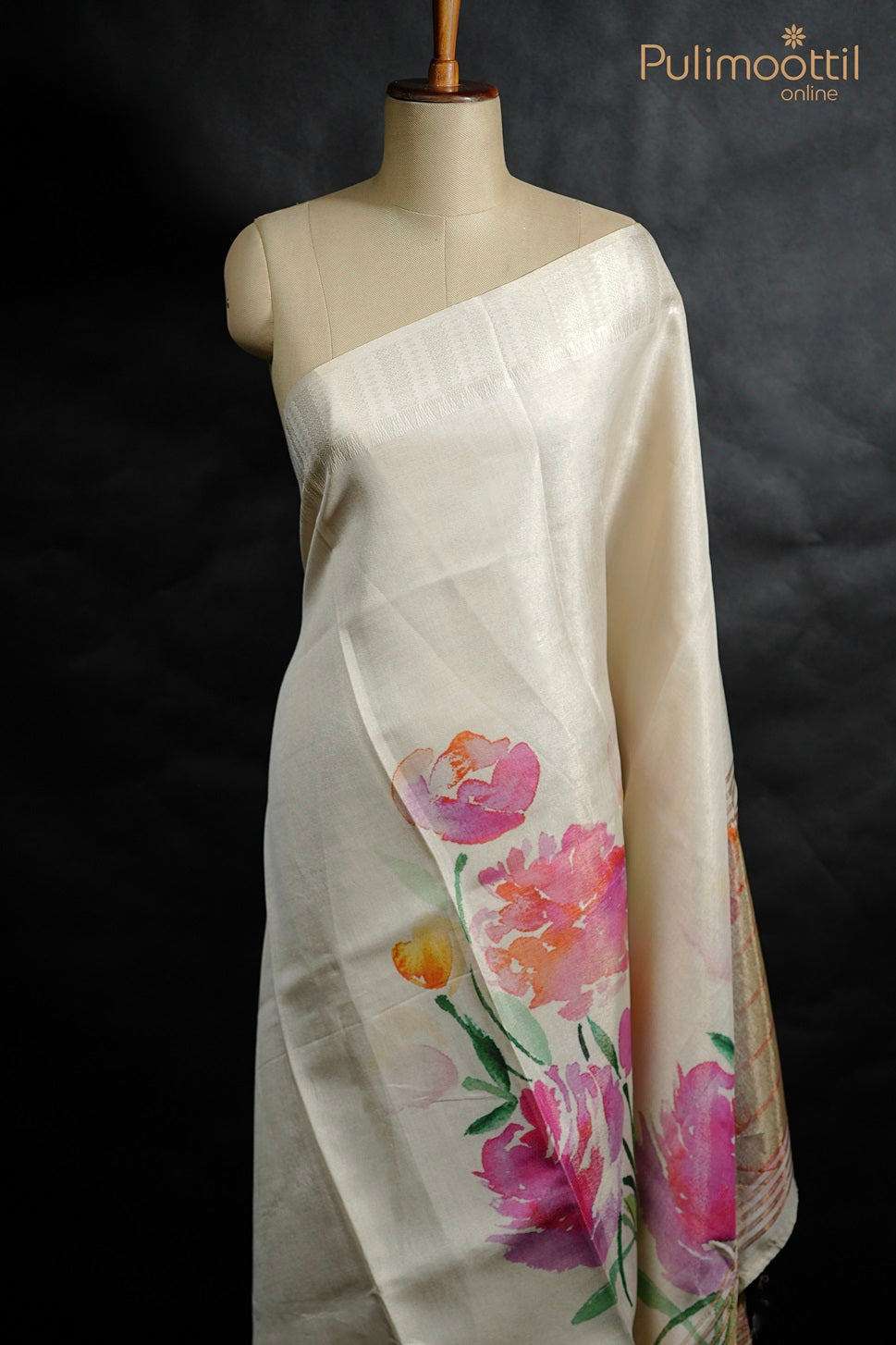 Cream Kerala tissue saree with hand-painted style floral print in pink and orange shades, displayed on mannequin.