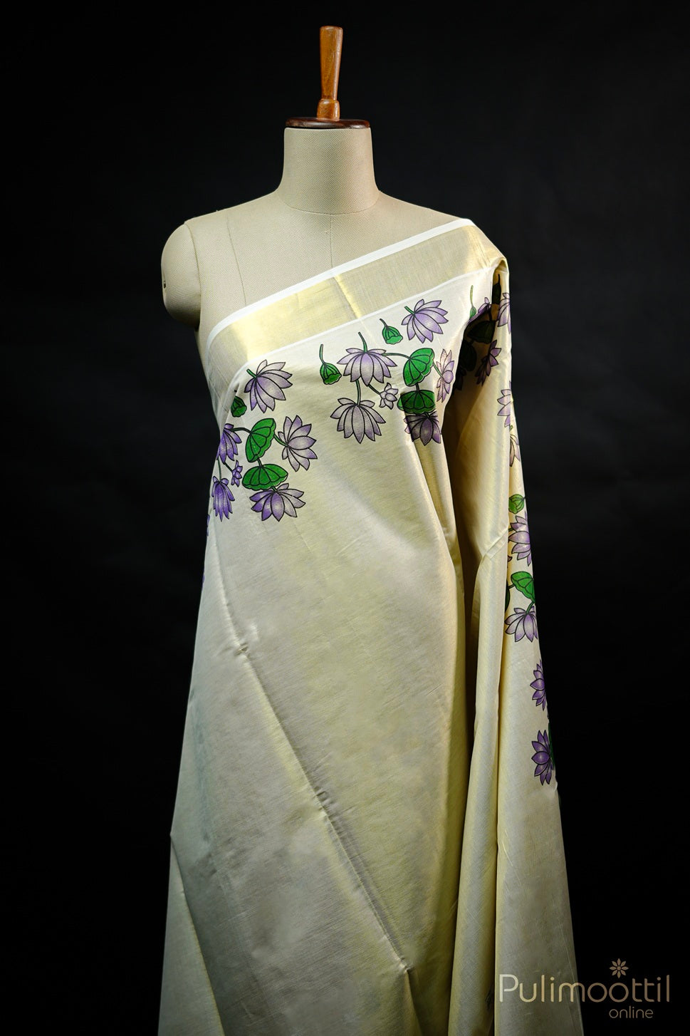 Golden tissue Kerala set saree with plain body and purple floral print near border, displayed on mannequin