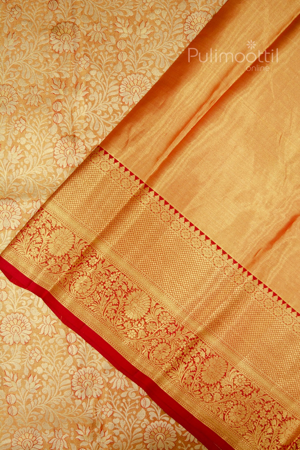 Kanchipuram tissue silk saree featuring golden zari floral motifs with rich red and gold traditional border – ideal for weddings and festive occasions