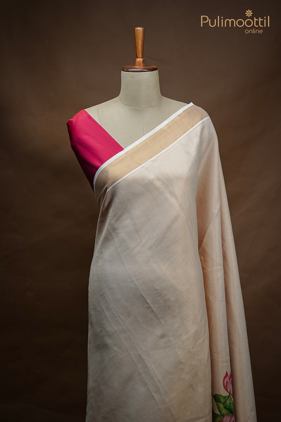 “Golden-tissue Kerala Onam set saree with single-side lotus print near border and matching tassel pallu.