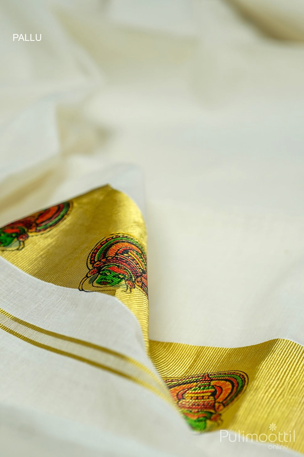 Traditional Onam cotton saree with golden Kathakali motif border