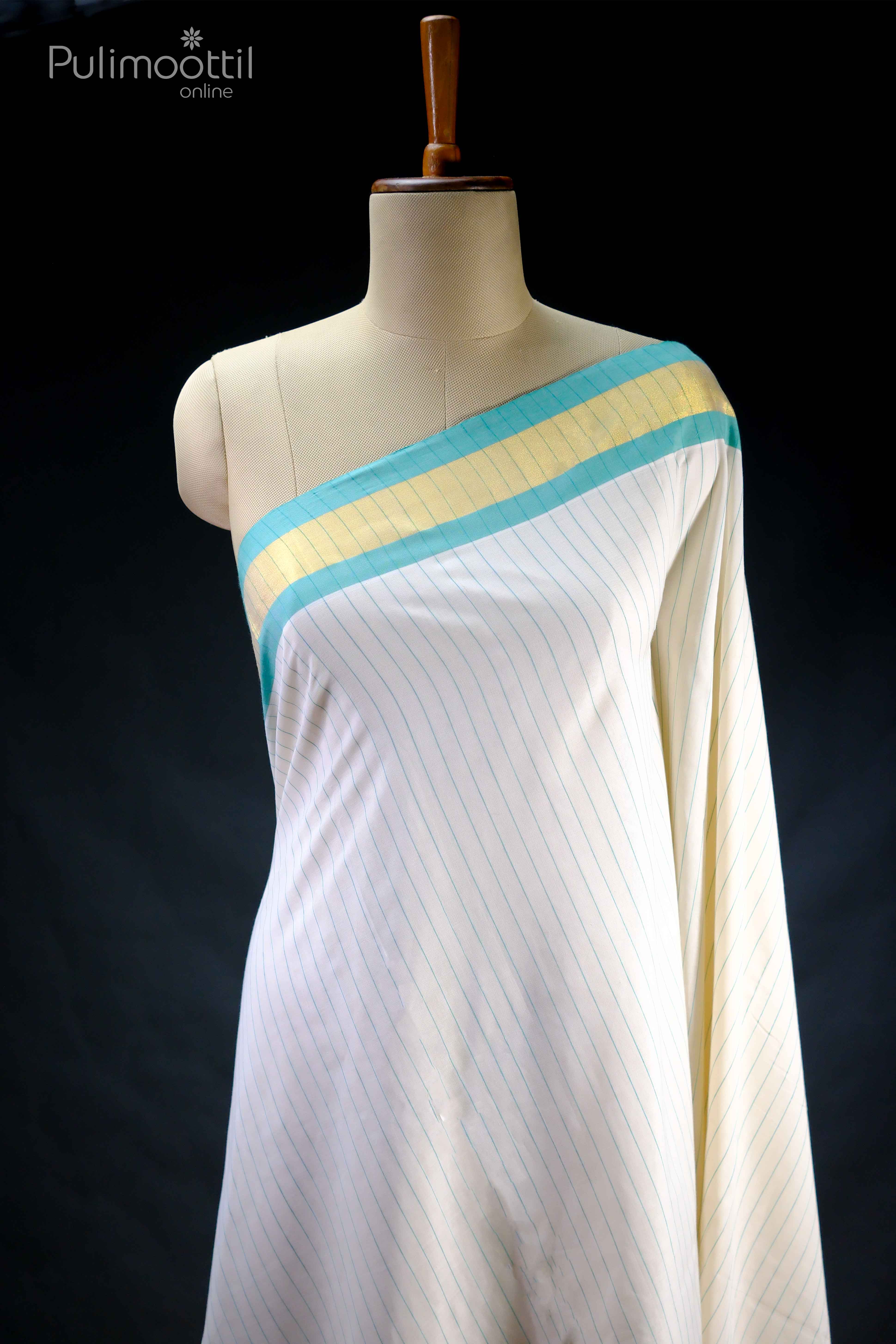Cream-white pure handloom Kerala saree set draped on a mannequin, featuring slender aqua-blue pinstripes throughout, and a bold aqua-blue and gold tissue border along the neckline.