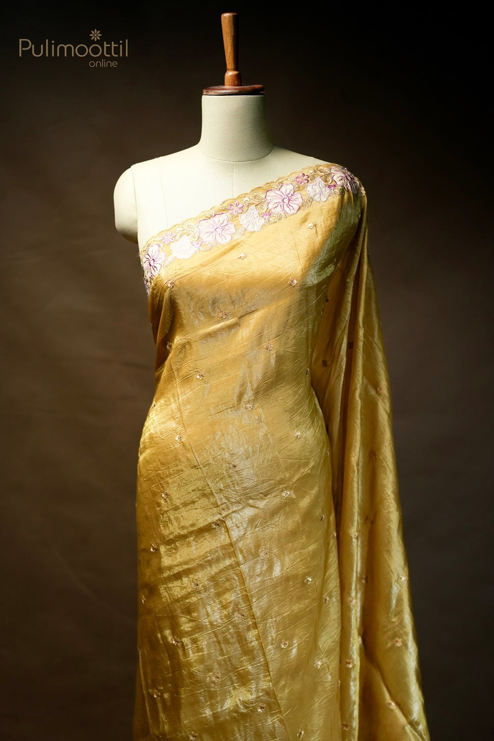 Caramel yellow-colored velvet organza appliqué work fancy saree.