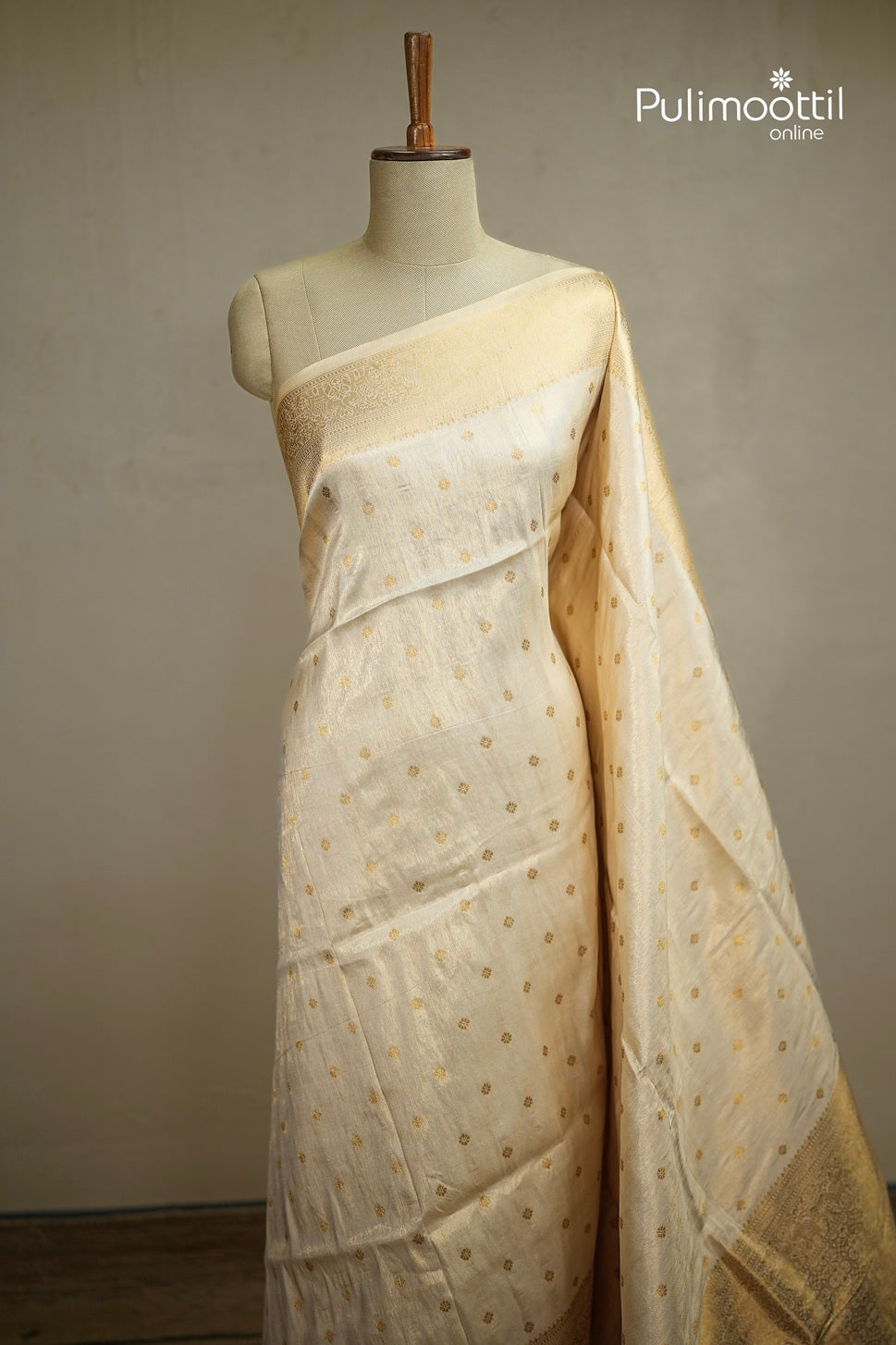 Offwhite Colour Golden Tissue Traditional Fancy Saree