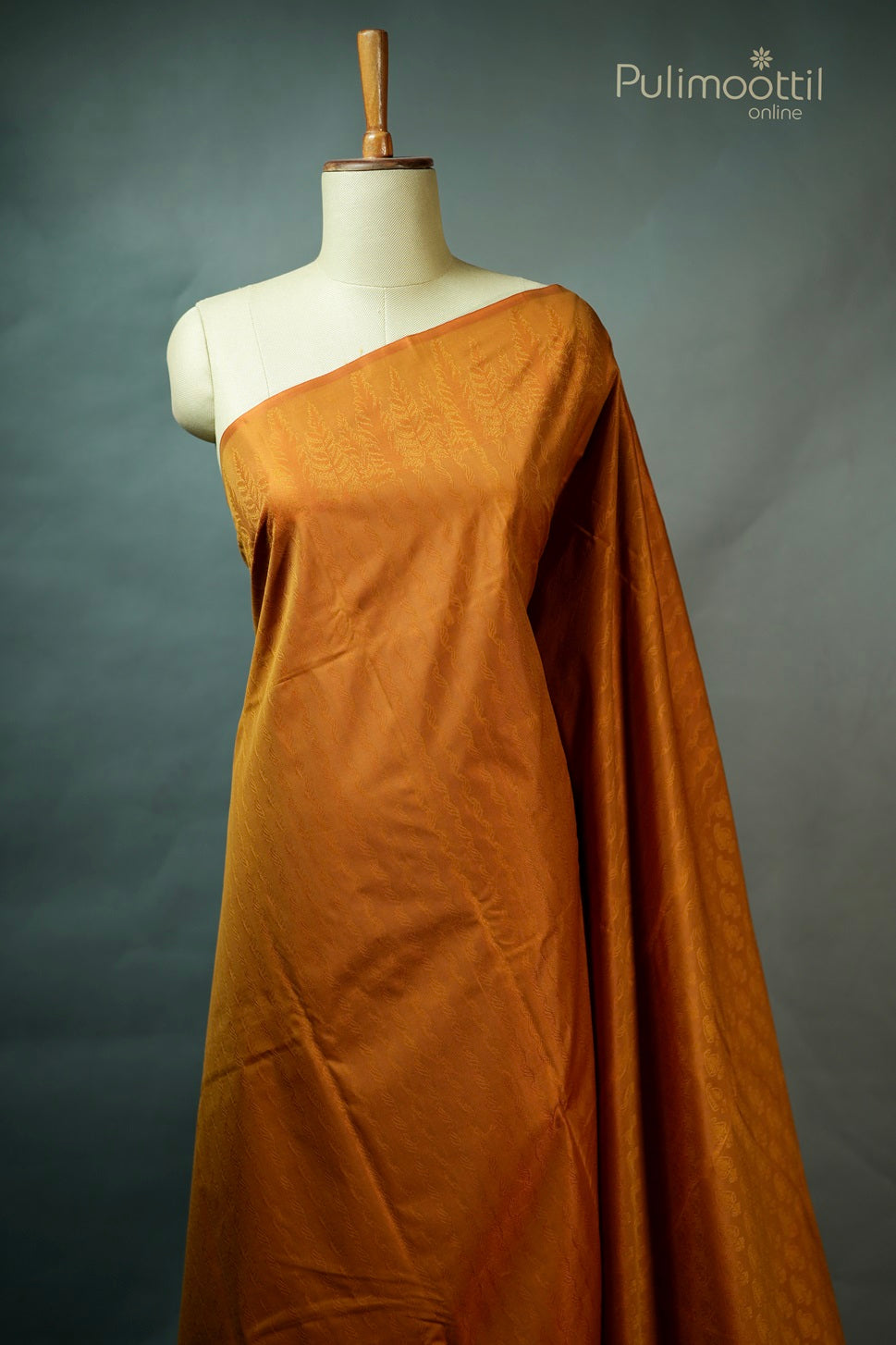 Ochre Colour Self Print Semi Silk Saree.