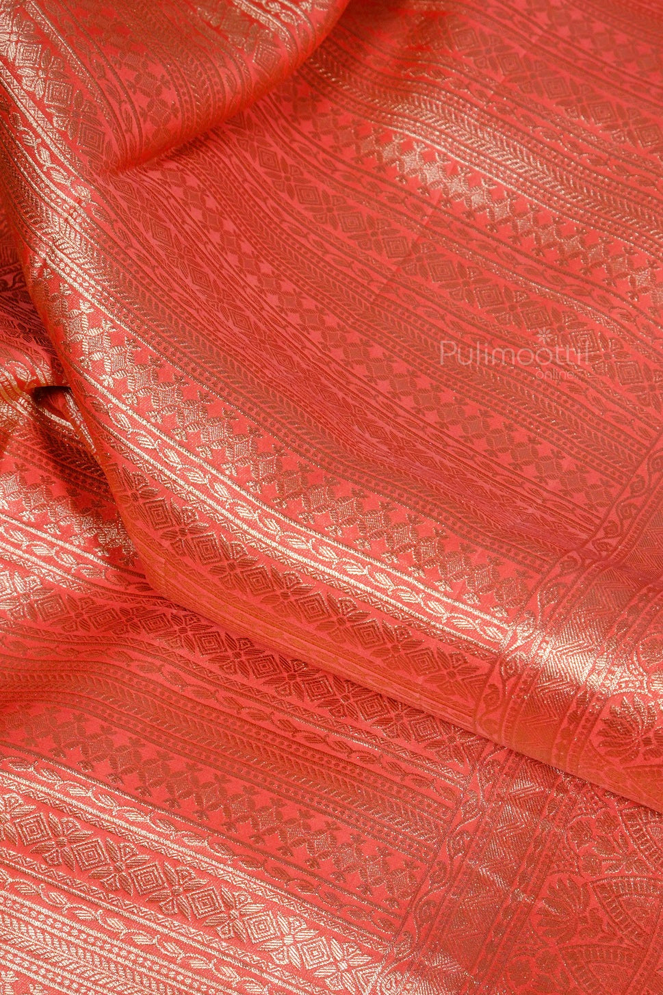 Pallu section of pure organza Banarasi saree in red with intricate golden zari designs.