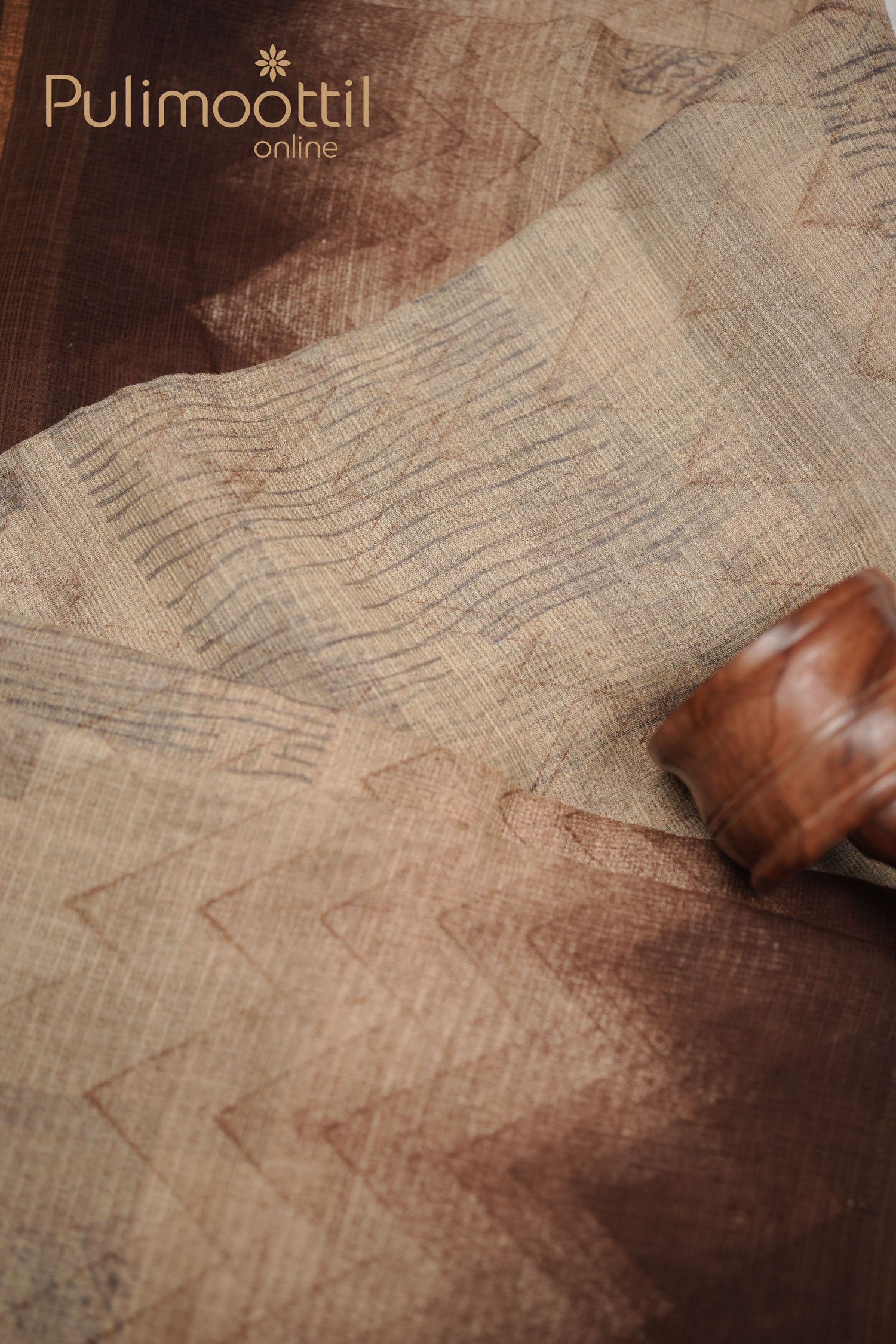 Elegant multi-shaded soft net-cotton saree featuring geometric zigzag patterns, complemented by a golden thin border.
