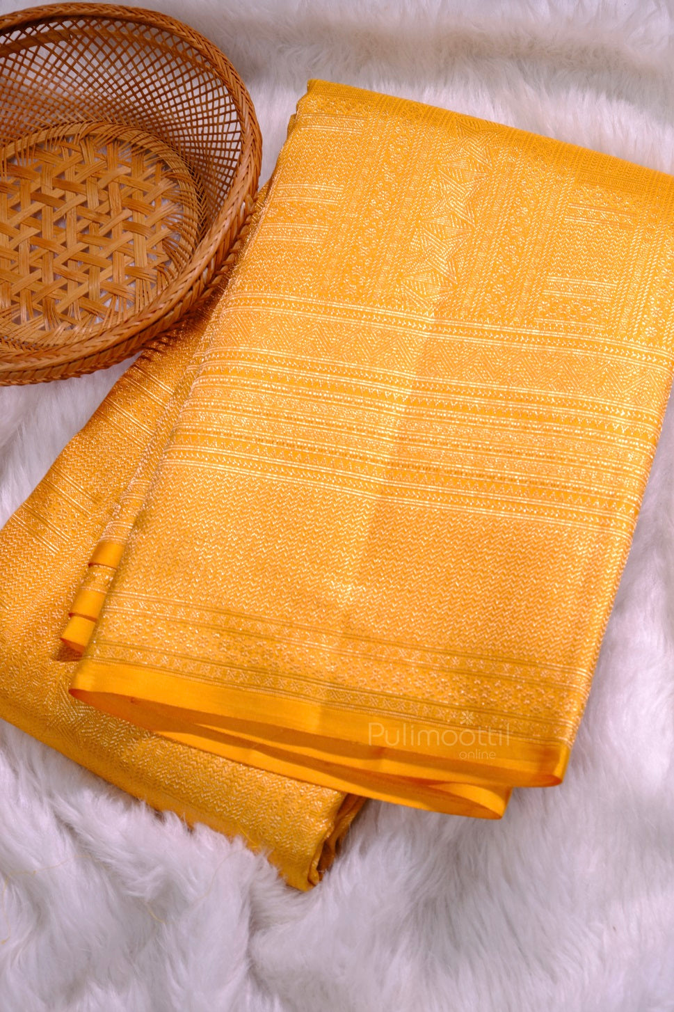 Mustard yellow Kanchipuram bridal saree with rich golden zari border