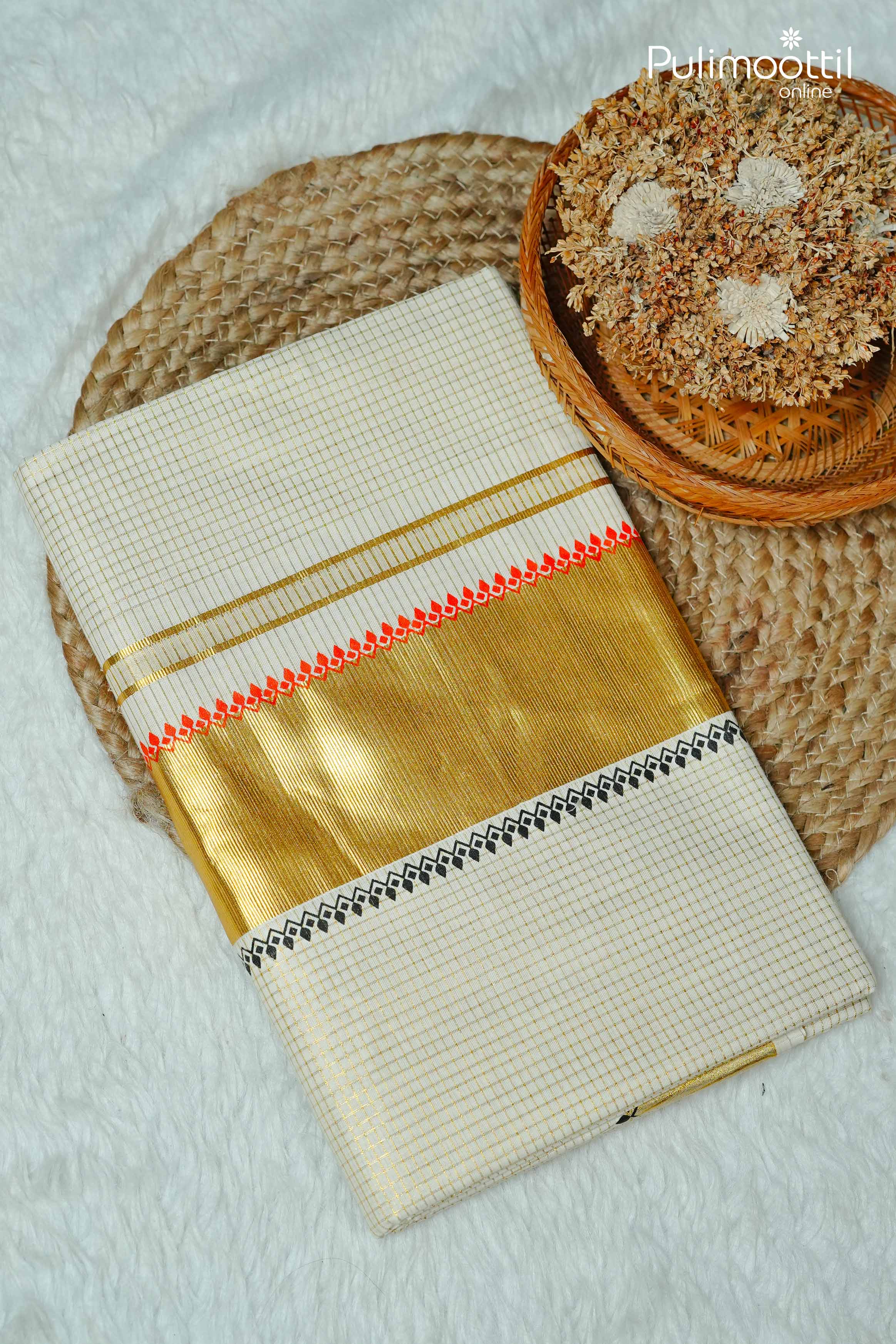 Traditional off-white Kerala kasavu saree featuring golden zari border and temple motifs