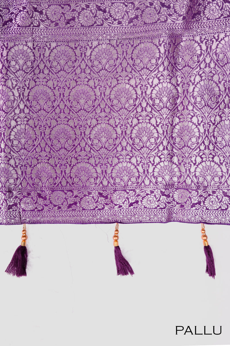 Violet color georgette Banarasi saree.