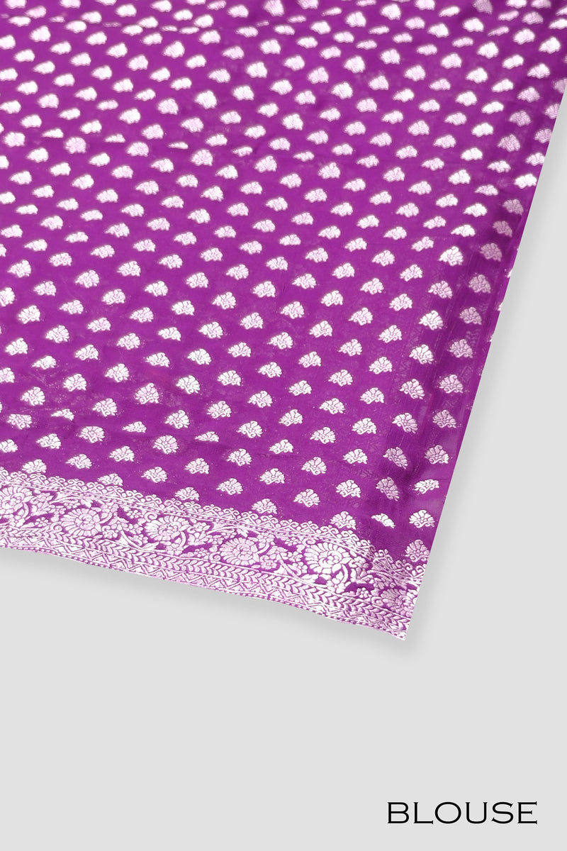 Violet color georgette Banarasi saree.
