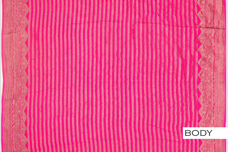 Rani pink color Banarasi saree.