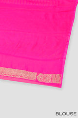 Rani pink color Banarasi saree.