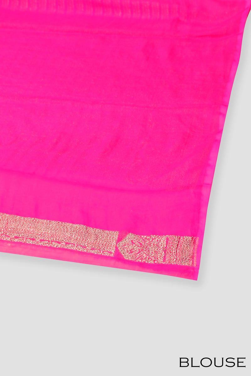 Rani pink color Banarasi saree.