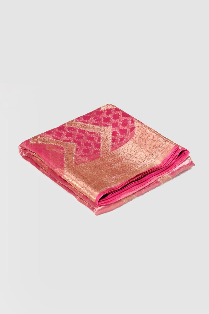 Pink color organza saree.