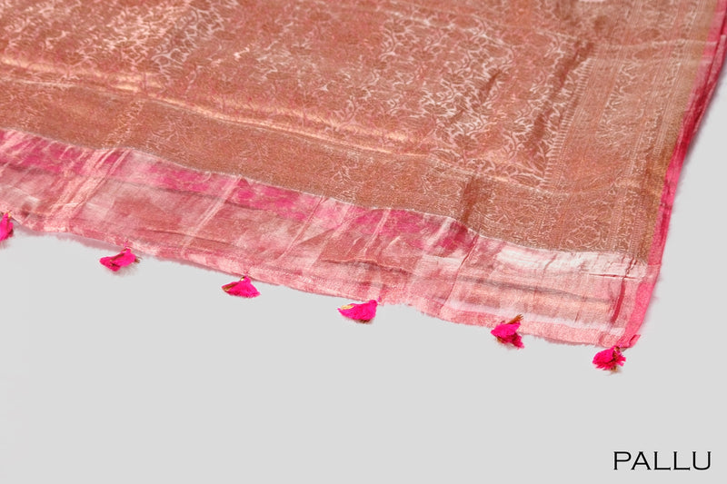Pink color organza saree.