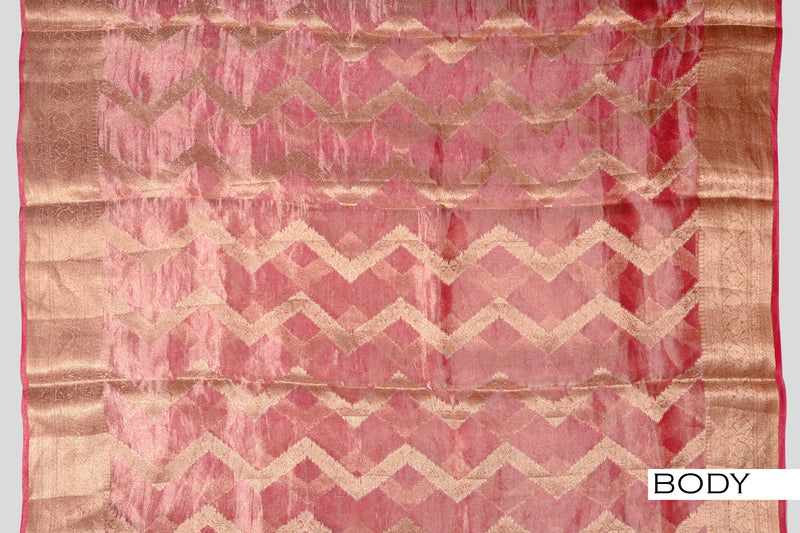 Pink color organza saree.