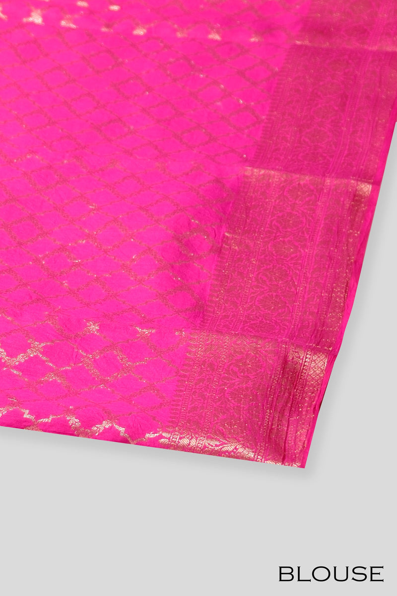 Pink color organza saree.