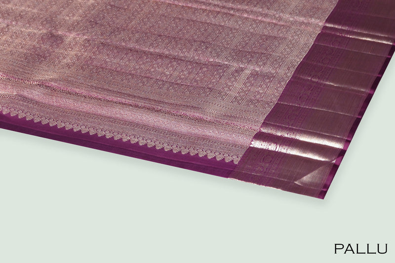 Wine color pure Kanchipuram wedding saree.