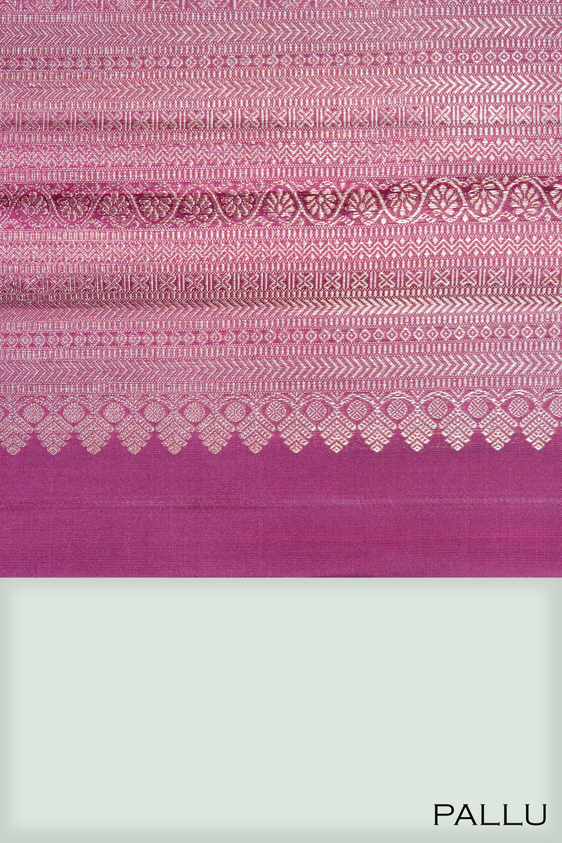Wine color pure Kanchipuram wedding saree.