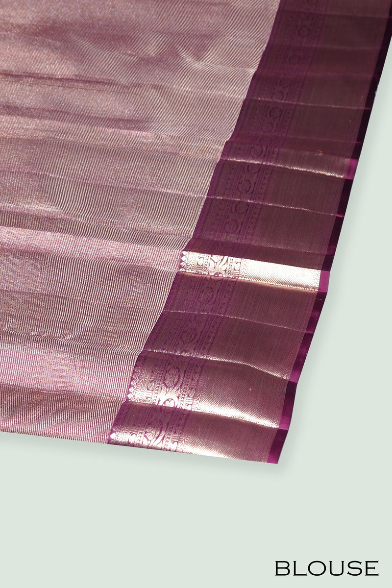Wine color pure Kanchipuram wedding saree.