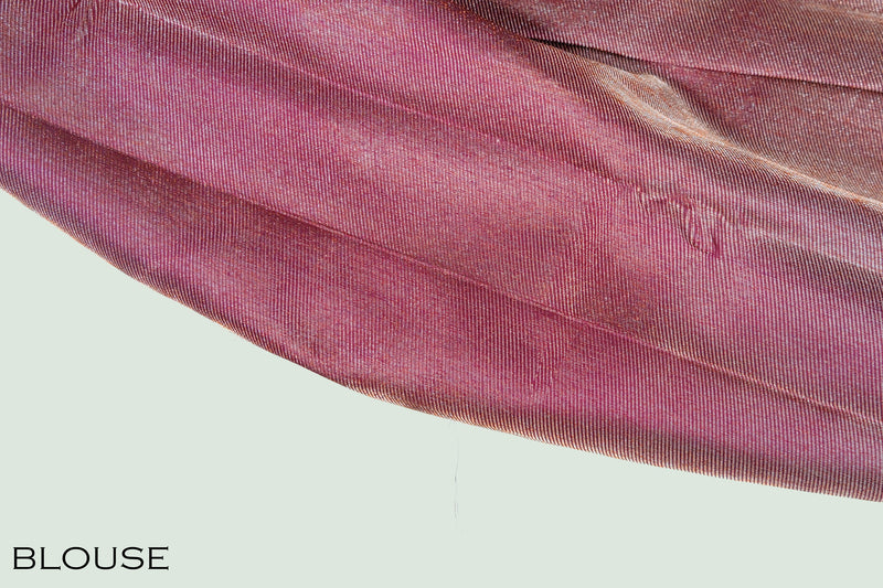 Wine color pure Kanchipuram wedding saree.