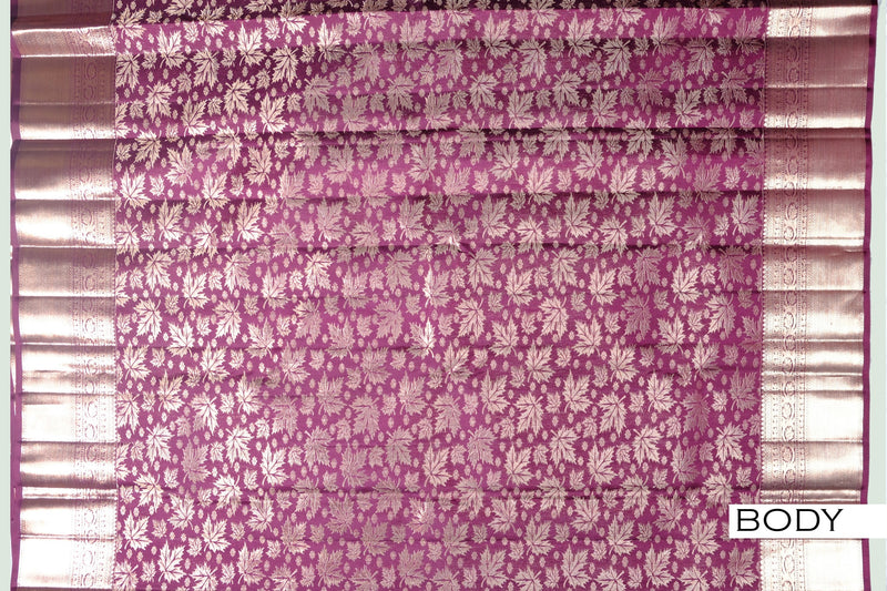 Wine color pure Kanchipuram wedding saree.