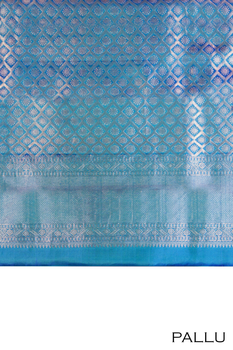 Peacock blue color Kanchipuram Brocade saree.