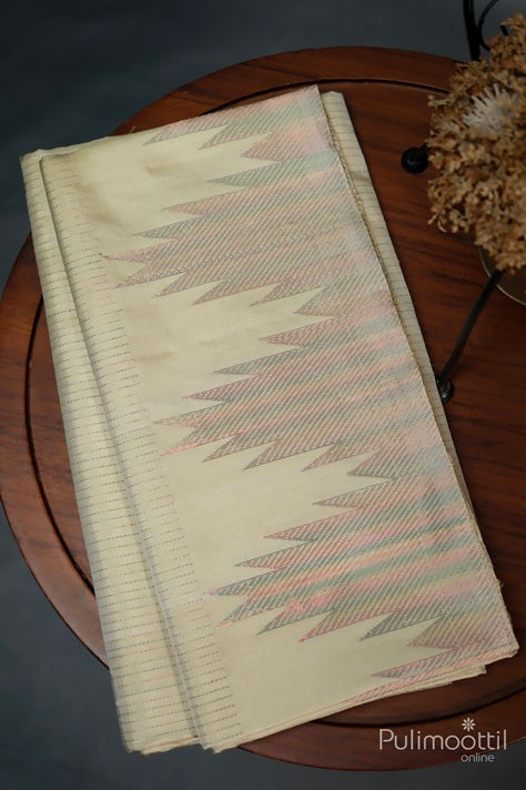 Folded pastel colour pure soft silk saree with multicolour zari stripes and traditional temple design border, displayed on a wooden surface.

