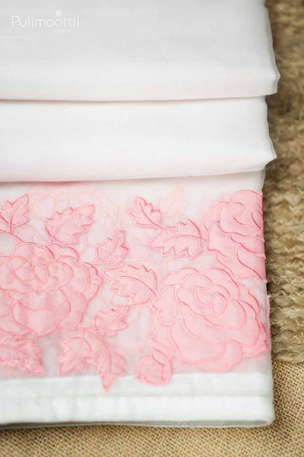 White Colour Organza Fancy Saree.