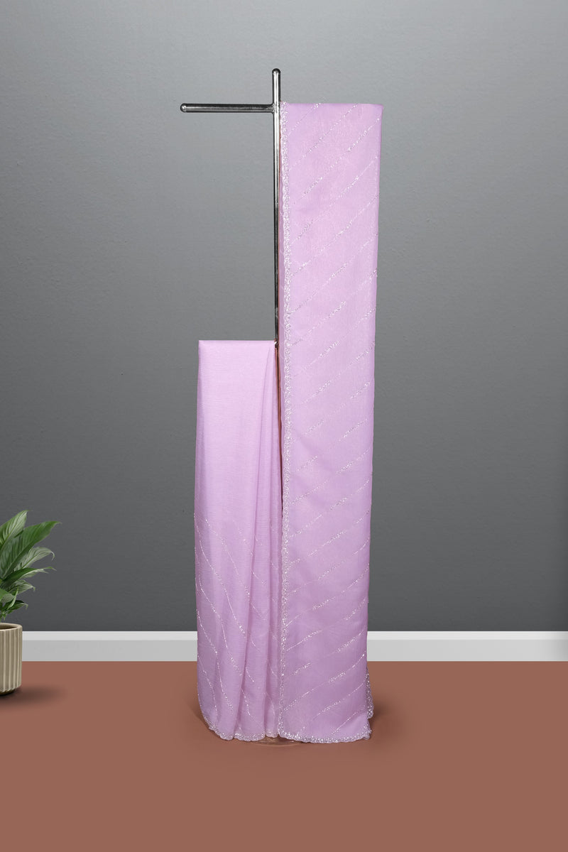 Lavender color crushed Organza saree.