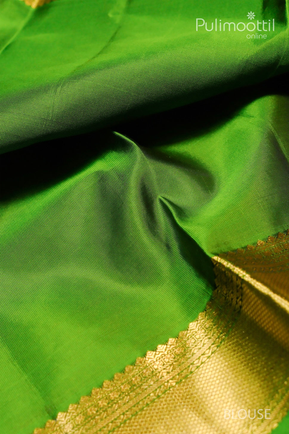 Close-up of the blouse section of the Wine Colour Pure Kanchipuram Silk Saree, showcasing the smooth green fabric with a golden zari border.