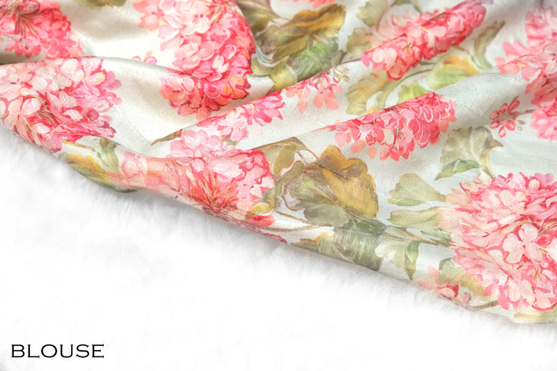 White color soft Organza printed saree.