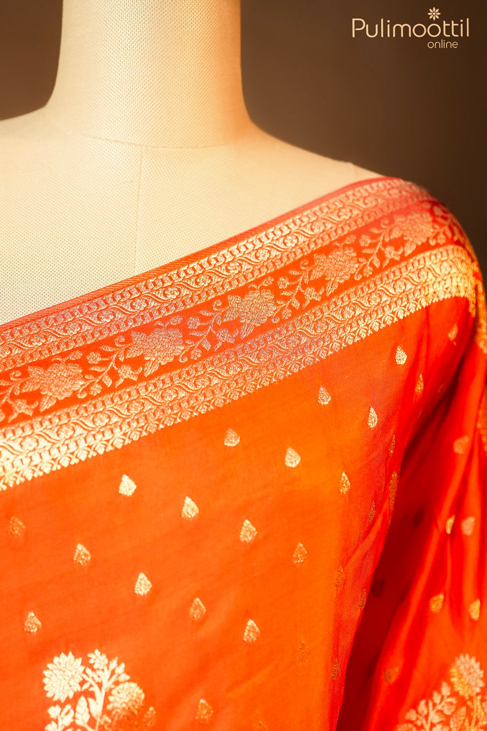 Reddish orange color Banarasi saree