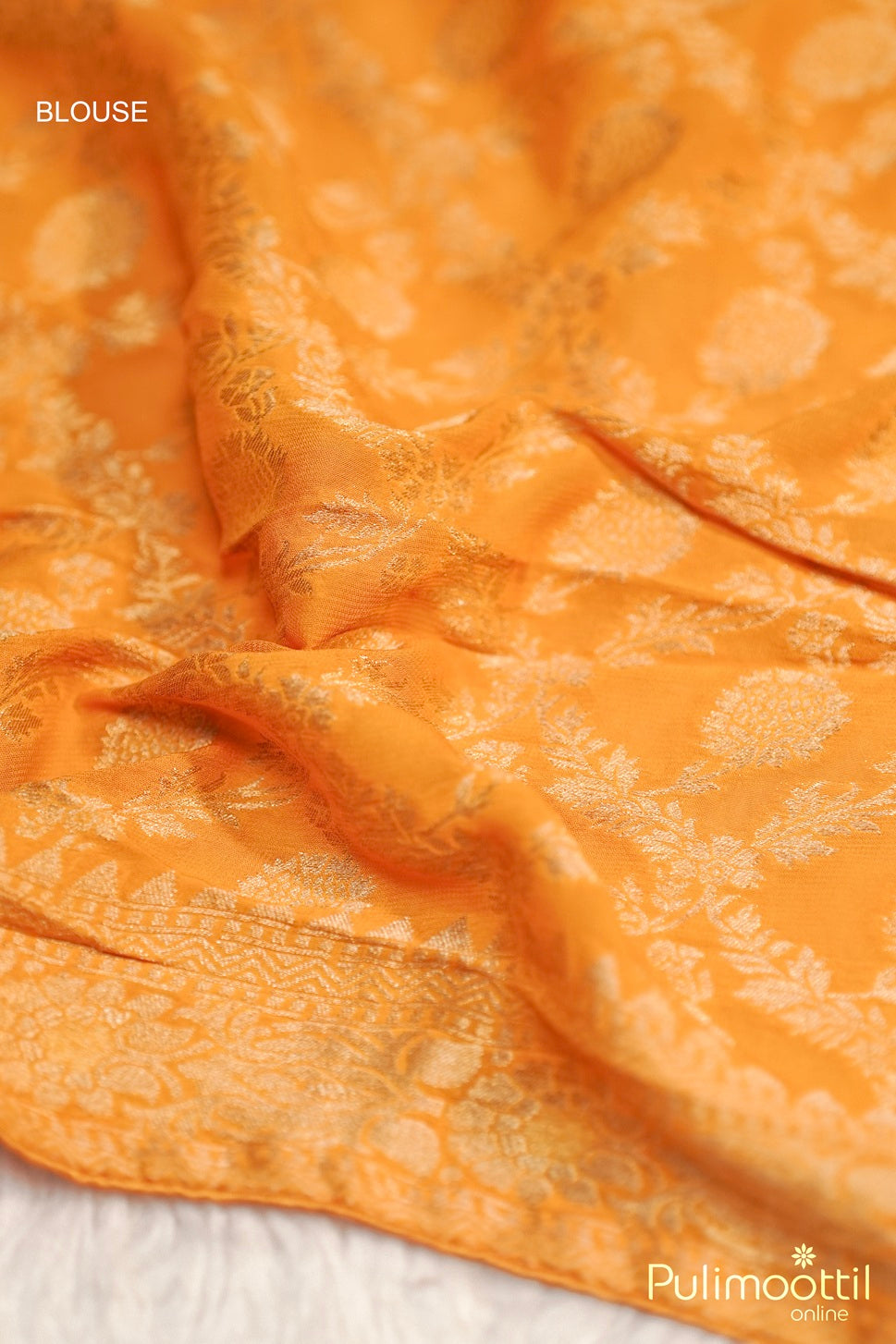  Designer blouse fabric in mustard yellow Banarasi silk with intricate golden motifs.