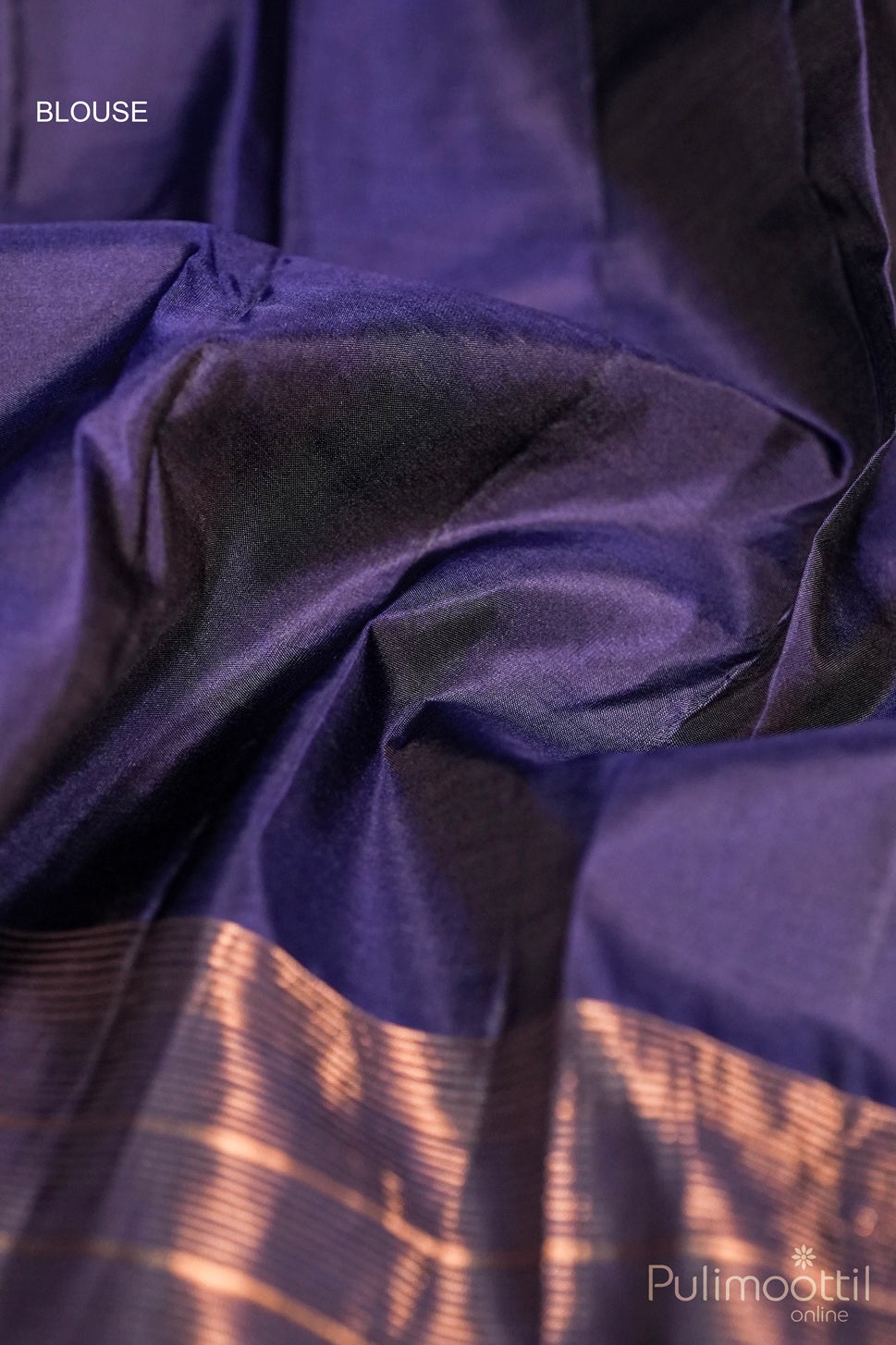 Blouse piece of maroon Kanchipuram saree with rose gold zari and contrast border in deep blue.