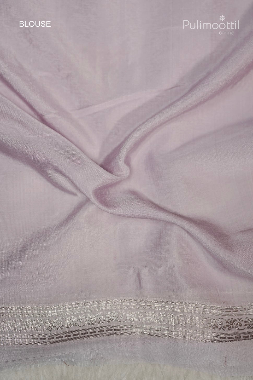 Contrast brocade blouse piece for ivory Banarasi silk saree, complementing the wedding saree or party wear look from Pulimoottil Silks.