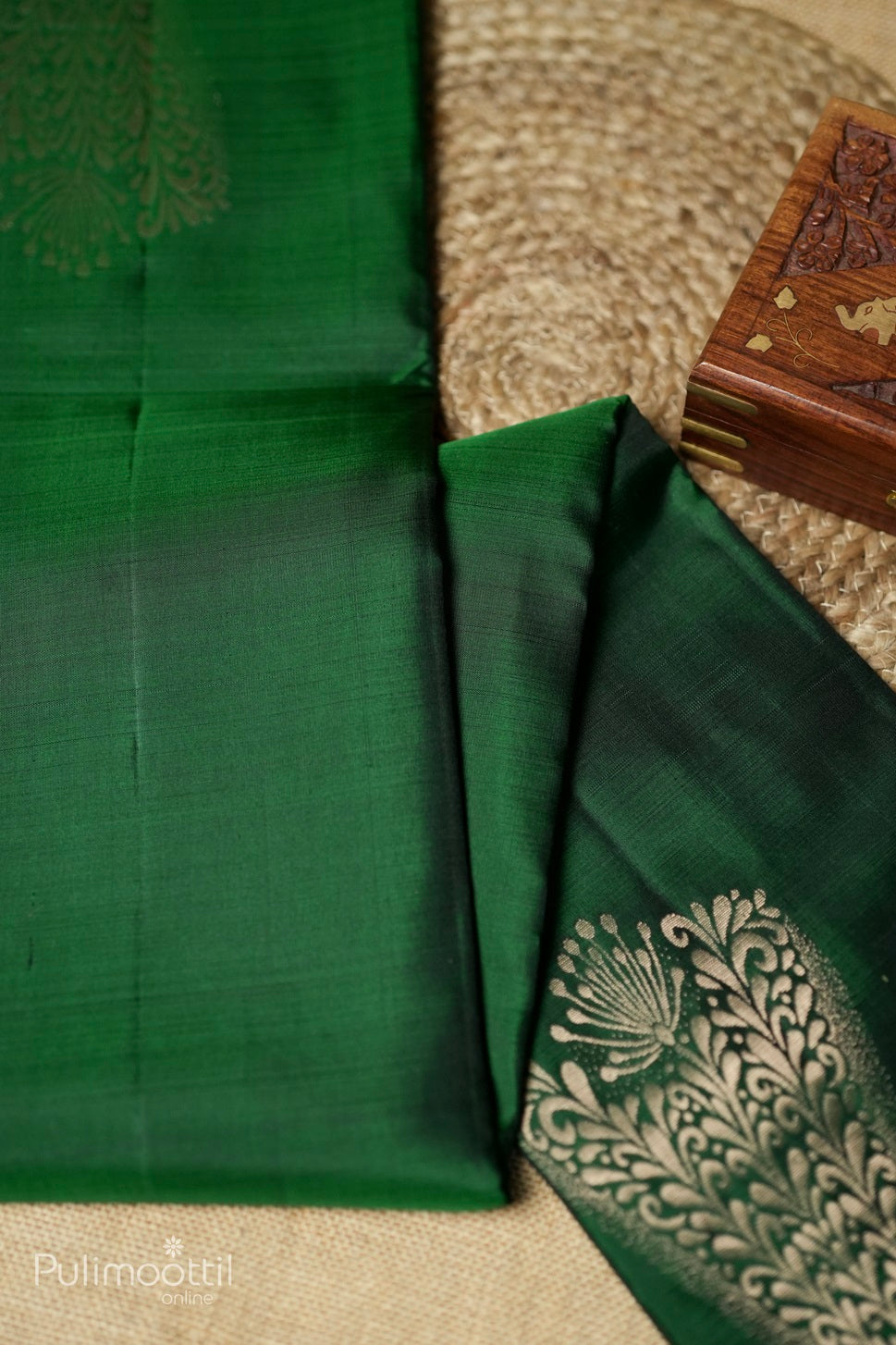 Bottle green-colored Kanchipuram soft silk saree